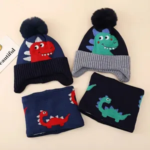 Kids winter knitted hat and scarf set featuring cute cartoon dinosaur jacquard warm thick beanie.
