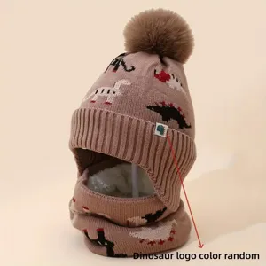 Kids winter knit hat and scarf set with cute dinosaur pattern and warm fleece lining.