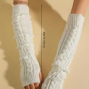 Detailed view of white cable knit arm warmers showing soft texture and fingerless design.