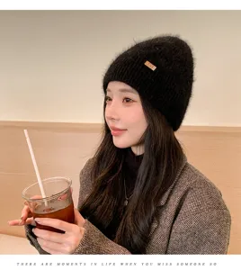 Women winter black knitted beanie hat warm wool cap casual soft pull-on headwear detail view