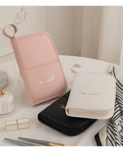 Portable large capacity makeup brush storage bag with handle and zipper for daily cosmetics.