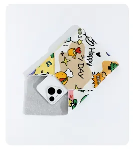 Detailed view of the self-adhesive magic wrapping cloth, showing colorful cute doodle prints.