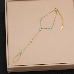 Dettagli del bracciale da dito in acciaio al titanio alla moda con perline blu, catena mano.