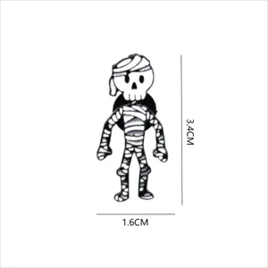 Halloween mummy enamel pin detail view, creative black and white ghost badge for clothing.