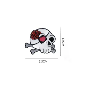 Cute cartoon skull enamel brooch with red rose and heart design for Halloween apparel.