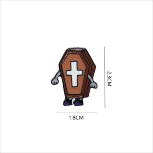 Cute Halloween cartoon coffin enamel pin detail view, featuring arms and cross design.