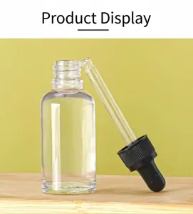 Detailed view of a 30ml clear glass dropper bottle for essential oils and serums