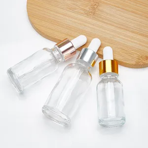 Set of three 30ml clear glass dropper bottles with gold silver rose gold collars