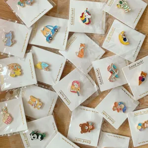 Cute assorted cartoon enamel pins brooches set for backpacks and clothing decoration.