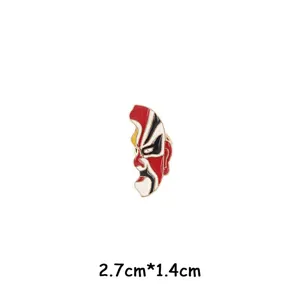 Detailed view of a Chinese opera mask enamel lapel pin, creative alloy brooch accessory.