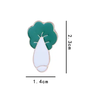 Detail view of the cute radish shaped alloy drip oil brooch, showing green leaf and white root.