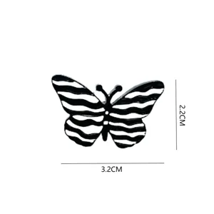 Spilla a farfalla con strisce zebrate in bianco e nero smalto lega gioielli moda