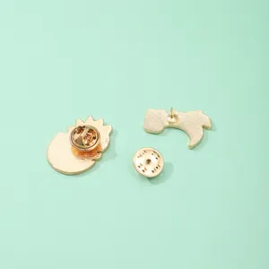 Cute dinosaur egg enamel pin reverse view, alloy metal badge backing and clutch accessories.