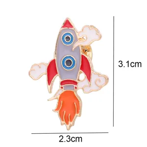 Close-up view of the cute space rocket enamel brooch showing fine details and dimensions.