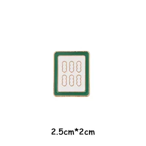 Close-up detail of the creative Chinese style mahjong enamel metal brooch pin badge.