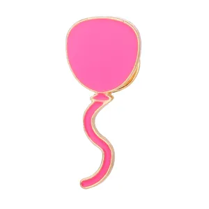 Cute pink balloon enamel pin detail, metal badge closeup showcasing exquisite gold trim finish.