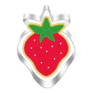 Close-up detail of the strawberry shaped metal cookie cutter with vibrant red and green enamel.