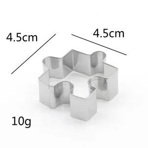 Stainless steel puzzle cookie cutter fondant mold baking tool for kitchen DIY pastry crafts.