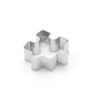Stainless steel puzzle cookie cutter detail, perfect for baking fondant shaping tools.