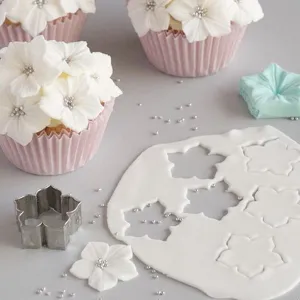 Stainless steel petunia flower fondant cutter set for professional cake decorating detail view.