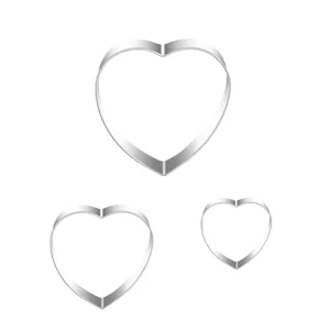 Detail close-up of stainless steel heart shaped cookie cutters, durable baking tool set.