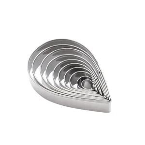 Stainless steel teardrop cutter detail shot, nesting 10-piece metal mold close-up view.