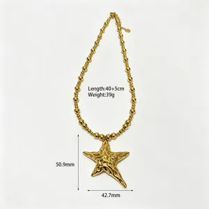 Gold stainless steel irregular starfish pendant necklace detail shot with bead chain design
