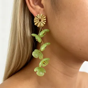 Long floral drop earrings with golden stud and translucent green resin petals for women.
