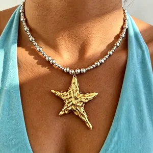 Stainless steel irregular starfish pendant necklace with mixed size bead chain for women fashion.