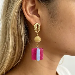 Detailed close-up of French retro color-blocked resin earrings with shell stud and drop.