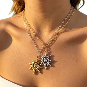 Layered stainless steel sun pendant necklace for women, fashion geometric jewelry gift.