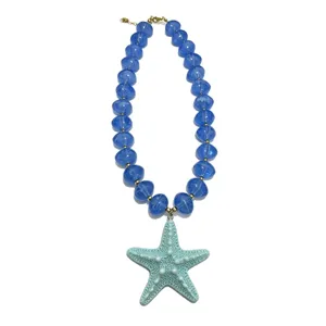 Blue acrylic beaded necklace with a cute starfish pendant for women, stylish dopamine jewelry.