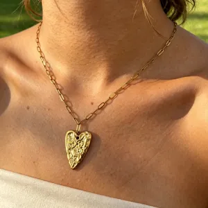Gold stainless steel paperclip chain necklace with textured irregular heart pendant for women.
