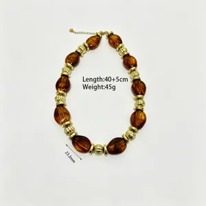 Bohemian resin beaded necklace for women, stylish amber and gold tone geometric jewelry.