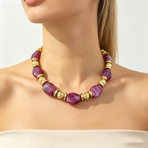 Chunky purple resin bead statement necklace gold metal spacer fashion jewelry detail shot