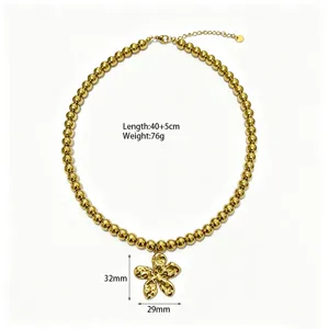 Gouden kraalketting met onregelmatige holle bloemhanger, stijlvolle sleutelbeensieraad sieraden.