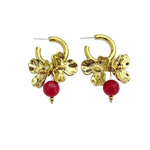 Gold metal flower and red bead drop earrings, trendy fashion jewelry for women stylish.