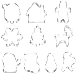 Stainless steel Christmas cookie cutter detail, various festive baking mold shapes close-up.