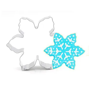 Stainless steel snowflake cookie cutter for holiday baking, durable metal pastry mold tool.