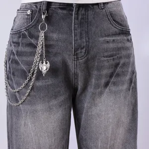Grey washed denim jeans for men with a cool metal hip-hop chain access for streetwear.