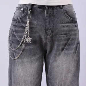 Men hip-hop metal waist chain pants chain with gothic star pendant paired with grey denim jeans.