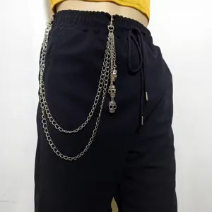 Vintage punk multi-layer metal waist chain with cool skull pendants for women streetwear.