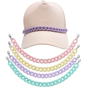 Detailed view of colorful rhinestone hat chains and beige baseball cap accessory set.