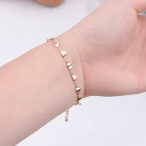 Gold heart chain anklet or bracelet, dainty metal link jewelry for women daily wear style.