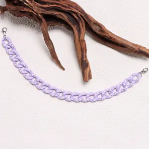 Purple rhinestone chain accessory for hats and bags with secure clasps. Trendy fashion decor item.