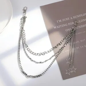 Multi-layer metal pants chain with star tassels, hip-hop style fashion accessory for women.