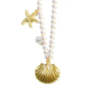 Ocean style pearl necklace detail, featuring golden seashell and starfish pendants elegant design.