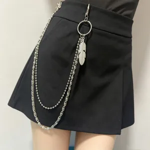 Punk style multi-layer metal pants chain with feather pendant, stylish waist accessory for women.