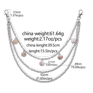 Chaine de pantalon en metal multicouche tendance avec pendentifs coquillages naturels.