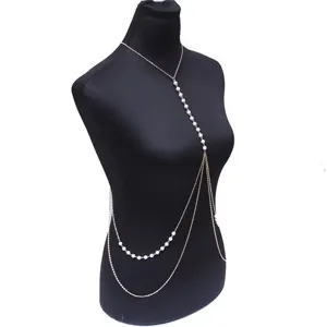 Detailed view of the vintage imitation pearl multi-layer tassel body chain jewelry.